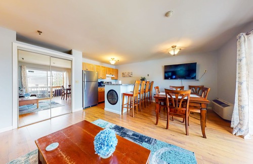 Gilford Condominio | Inviting condo in quiet locale with partial lake views, balcony & grilling area