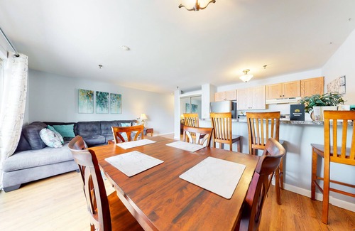 Gilford Condominio | Inviting condo in quiet locale with partial lake views, balcony & grilling area