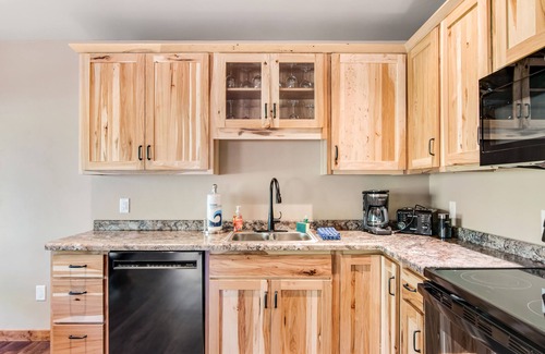 Conover Casa | Inviting dog-friendly cabin with hot tub, fireplace, patio, grill, central AC, & W/D