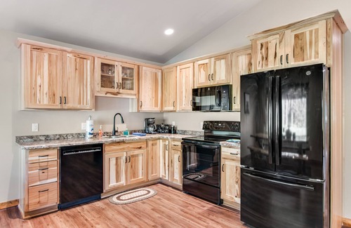 Conover Casa | Inviting dog-friendly cabin with hot tub, fireplace, patio, grill, central AC, & W/D