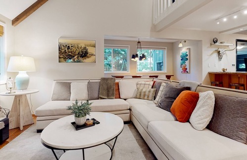 Lake Grove Casa | Inviting home with enclosed yard, firepit, hot tub, hammock, washer/dryer