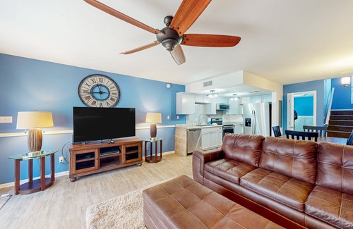East End Casa | Inviting townhouse with on-site pool, updated interior, & W/D