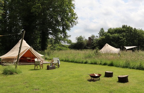 Swannington Cabina | Iris, Lilypad and Bulrush are luxury bell tents all set privately in a wild meadow.