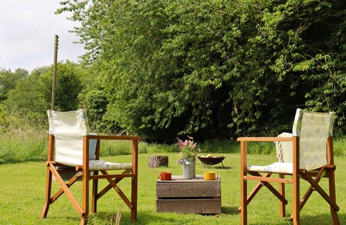 Swannington Cabina | Iris, peaceful and hidden away in rural Norfolk amongst wild flowers.
