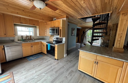 Placida Casa | Island Beach Barn - charming vacation house with bay/dock and beach access