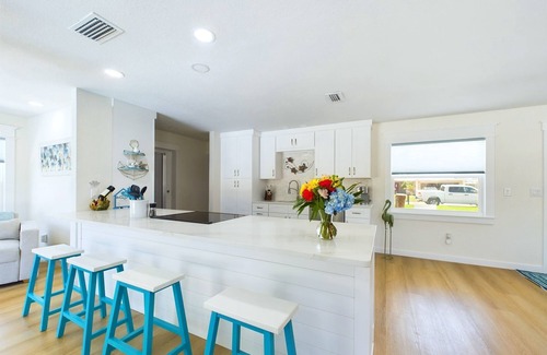 Surfside Estates Casa | Island Oasis with Heated Pool, Putt Putt Course, Tiki Bar, and Beach Gear!