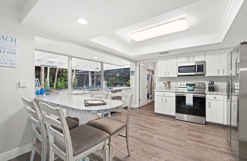 Villa De Palmas Casa | Island Paradise~ Heated Pool~ Family Fun~ Near Beach