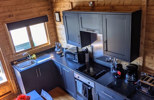 Llanfairpwllgwyngyll Cabina | Isle of Anglesey - cute dog friendly cosy cabin with dedicated EV charging