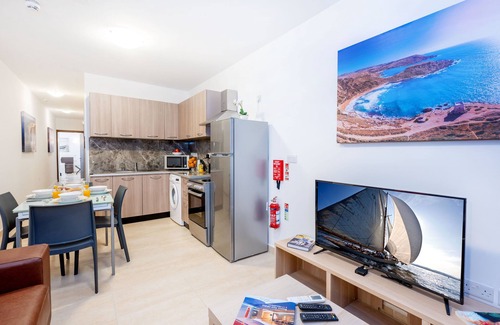 Bugibba Apartamento | Islet Promenade Seafront 1 Bedroom Apartment with 2 seaview balconies