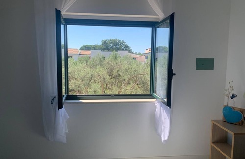 Sant'Andrea Apostolo dello Ionio Casa | Casa de vacaciones 'Casa Del Sole' con terraza privada y aire acondicionado