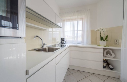 Tramin Apartamento | cómodo departamento con cesped