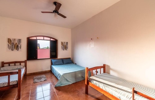 Raul Cury Casa | Itanhaém Casa ampla com piscina e churrasqueira a 300m da praia