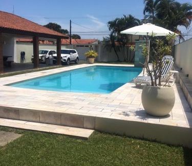 Cibratel II Casa | Itanhaém Maravilhosa, Bilhar, Sky, WiFi, Piscina e churrasqueira grande, Gramado, Casa linda de alto padrão a 600m praia