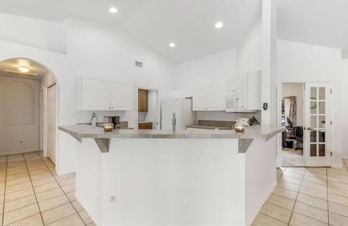 Lehigh Acres Casa | Its a beautiful house for your vacation with heated pool and screen enclosure.