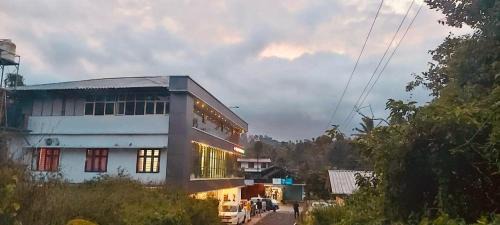 Muttil South Hotel | J TEN Residency