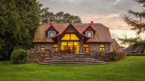 Julchendorf Casa | J1 Idyllisches Ferienhaus mit Seeblick