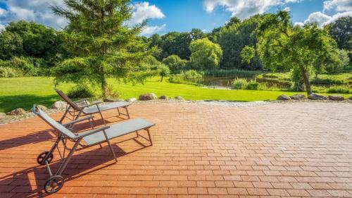 Julchendorf Casa | J1 Idyllisches Ferienhaus mit Seeblick
