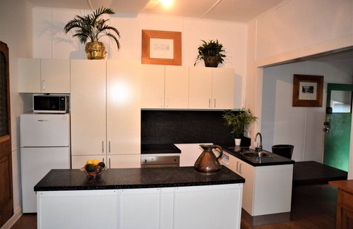 Brunswick Heads Apartamento | Apartamento loft Garden de 2 dormitorios con balcón con vistas al jardín tropical