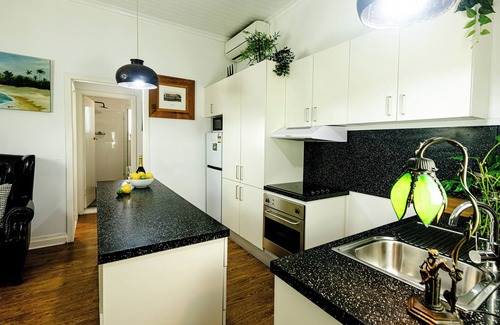 Brunswick Heads Apartamento | Apartamento loft Garden de 2 dormitorios con balcón con vistas al jardín tropical