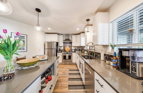 Concrete Casa | Jay's Salmon Run Retreat Breathtaking Riverfront Views-Hot Tub, Firepit, Pinball