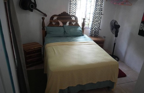 Fairy Hill Casa | Jeff's Downstairs Room at Robin Hood guesthouse