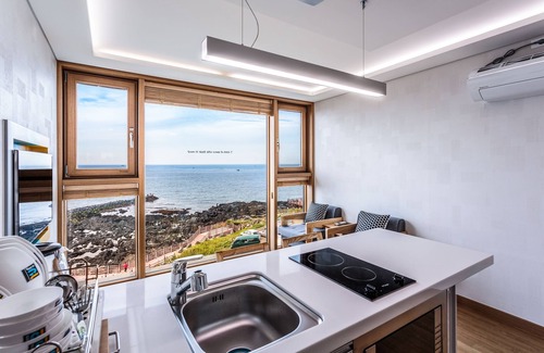 Downtown Condominio | Jeju Ollero