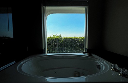 Whittier Casa | Jetted Tub View Suite: Comfort & Scenic Serenity