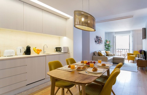 Chiado Apartamento | JOIVY Sunny 1-bed flat w/terrace&sea view in Baixa, 3mins to Arco da Rua Augusta