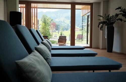 Maria Alm am Steinernen Meer Casa | Junior Suite Deluxe Morning Time Longstay - Hotel Morning Time Naturally. Cama y brunch