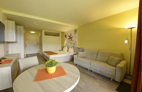 Drobollach am Faakersee Cama Y Desayuno | Junior Suite mit Seeblick Typ A1 - Seepark Drobollach