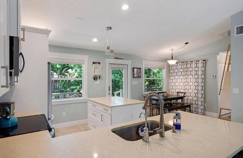 Jupiter Casa | Jupiter Farms Tropical Oasis with Lush Landscaping