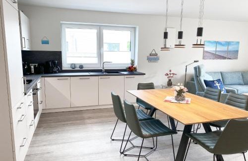 Tossens Apartamento | KÜSTE33/48 – Penthousewohnung mit Dachterrasse, Sauna - strandnah!