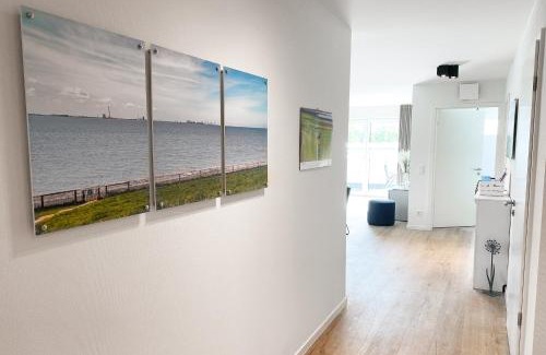 Tossens Apartamento | KÜSTE33/48 – Penthousewohnung mit Dachterrasse, Sauna - strandnah!