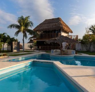 Puerto Morelos Hotel | Kabañas Ojo de Agua