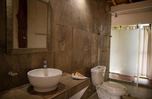 Puerto Morelos Hotel | Kabañas Ojo de Agua
