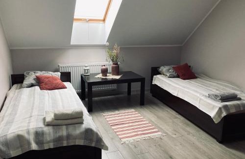 Zmigrod Casa | Kamienica pod Rakiem