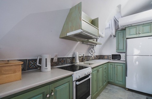Kalyves Apartamento | Karavos View - A unique artists' hideaway Paradise