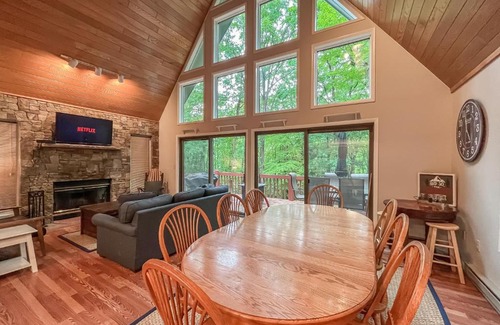 Swanton Villa | Kayaks Included Lakefront Home w Fire Pit Hot Tub Dock