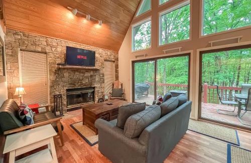Swanton Villa | Kayaks Included Lakefront Home w Fire Pit Hot Tub Dock