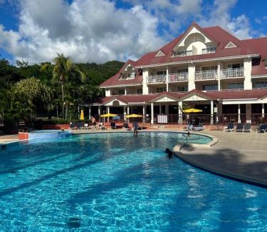 Gros Raisins Apartamento | Kaz Caraïbes spacieuse, accès piscine et plage - Résidence