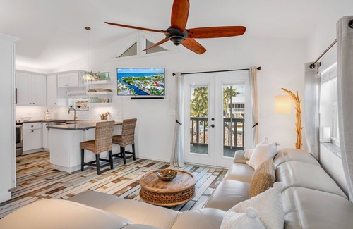 Twin Lakes Casa | Key Largo Canalfront Home w/ Boat Lift, Swim Spa, Tiki Hut & Game Room