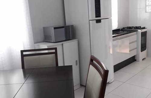 Balneario Mogiano Casa | DIRECCIÓN DE LA PLAYA, BORACEIA ,, BERTIOGA, 3 SUITES CON AIRE ACONDICIONADO PISC. PARTIC. Barbacoa