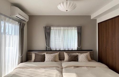 Maekawa Apartamento | Kin-Con-Kan 301 新築 那覇空港から車で25分 コンビニ徒歩1分 沖縄ワールド徒歩9分ファミリーや長期滞在者にもお勧め