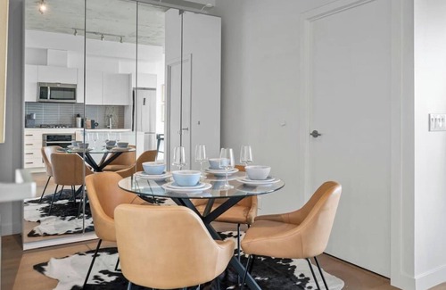 Connaught Condominio | King Bed|AC |UG Park |DT Views |Mins to Saddledome