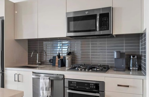 Connaught Condominio | King Bed|AC |UG Park |DT Views |Mins to Saddledome