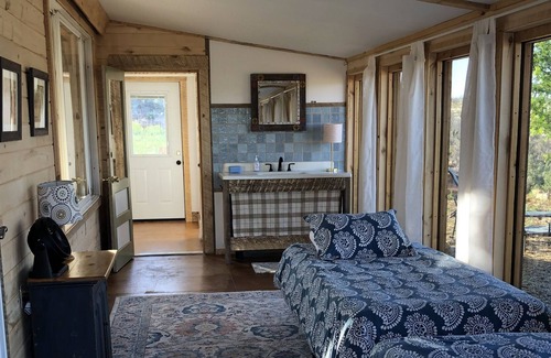 Lewis Cabina | King Bed comfort, great views with complimentary gourmet farm breakfast.