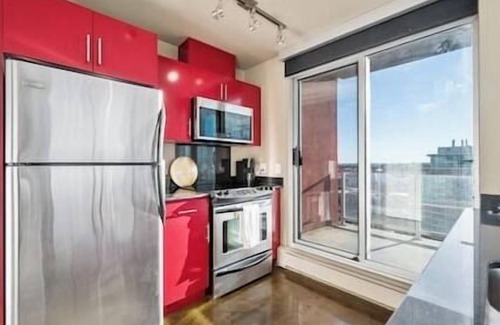 Victoria Park Apartamento | King Bed | DT Views | UG Park | Walk to Saddledome