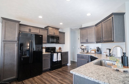 Brookline Station Casa | King Bed, Smart TV, Tesla Charger, Garage, Quiet Neighborhood, 15 min Downtown!