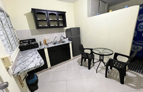 Los Charamicos Apartamento | Kitchenette 5 minute walk from Sosua Beach!