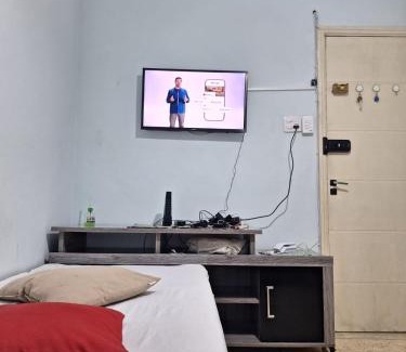 Boqueirao Apartamento | kitnet pé na areia, em frente a praia.